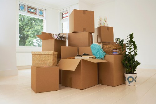 Mover using PPE while loading items for a Clapham Common van service